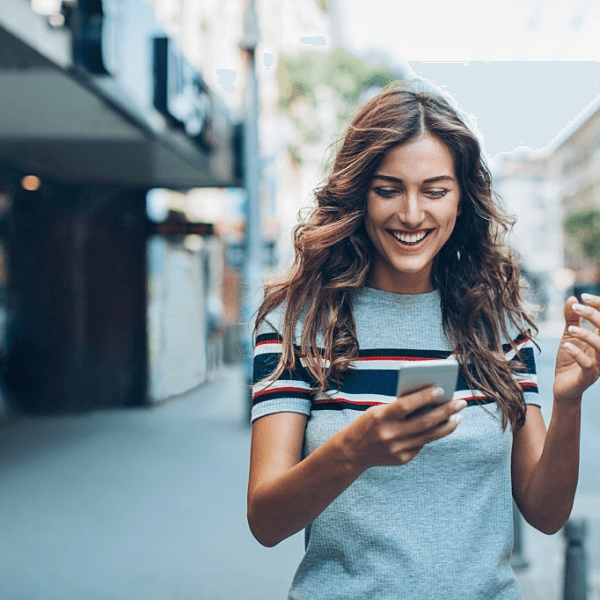 a woman holding a phone